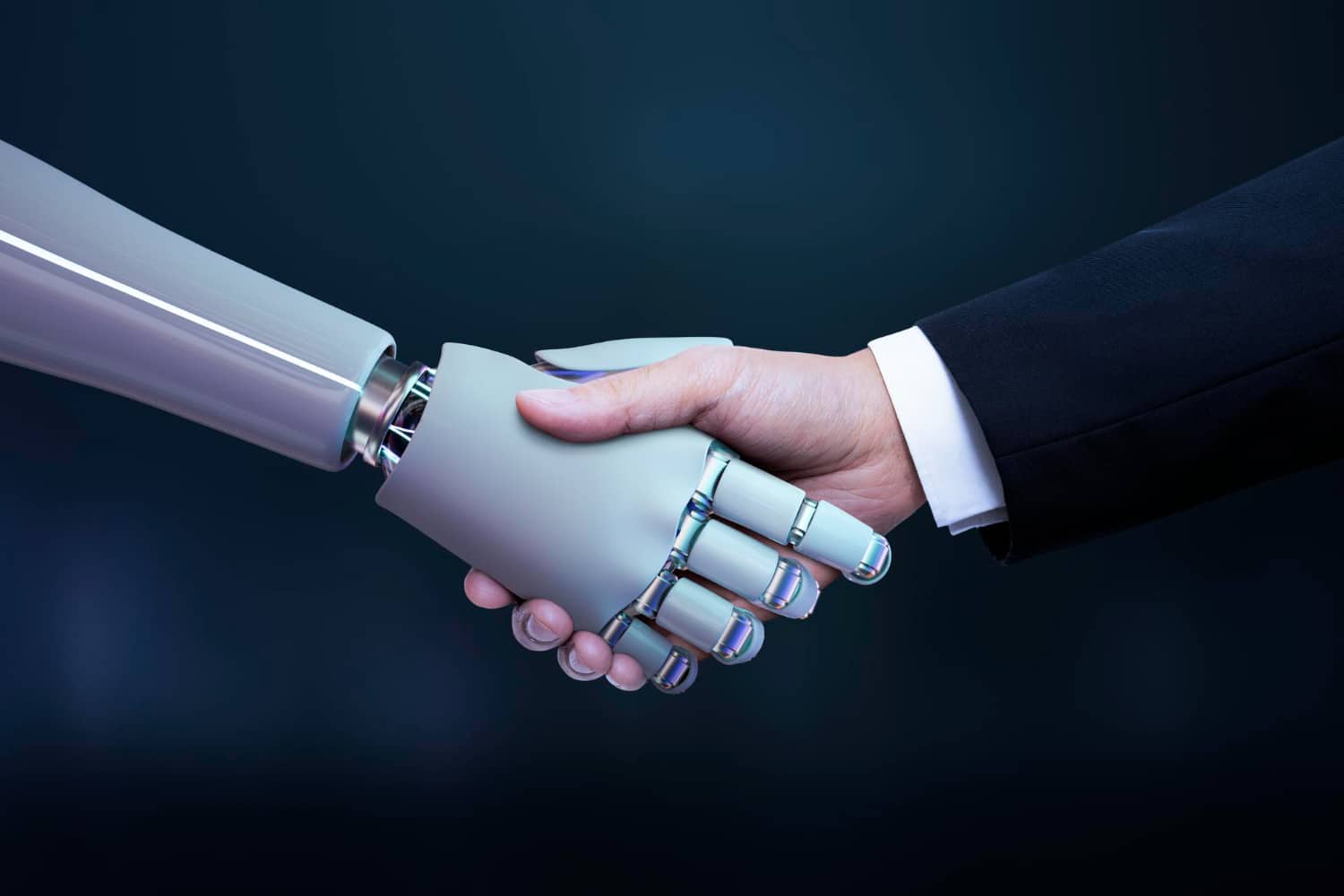 Deux personnes se serrant la main, celle de gauche étant un robot représentant l'intelligence artificielle, celle de droite une main humaine en costume représentant l'humanité et les entreprises.