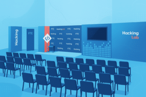 Salle de conférence technologique vide dont les chaises font face à une scène pendant un événement de hacking lab.